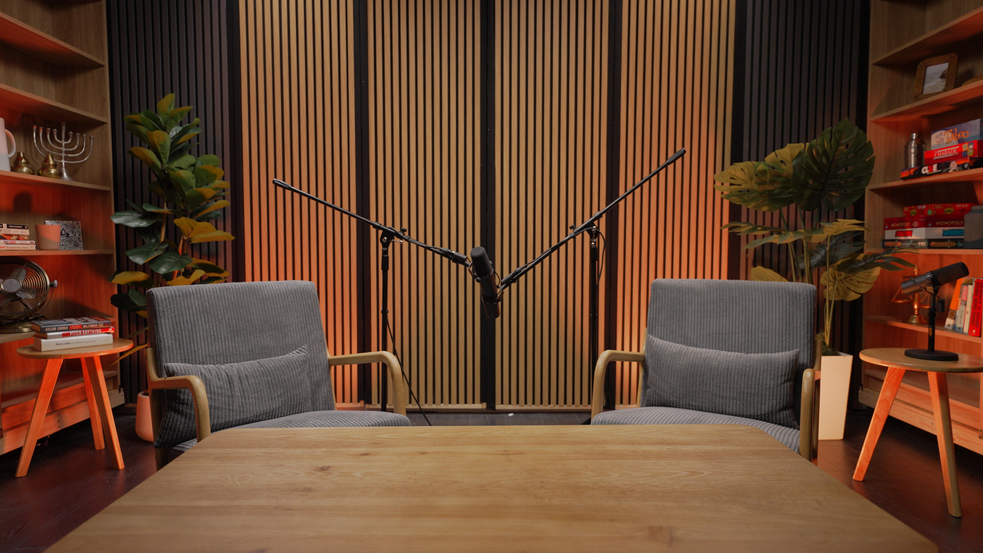 Two chairs and microphones on the Studio Six set